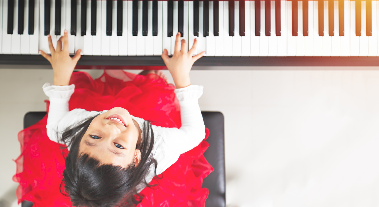 Little Girl Playing Piano 
